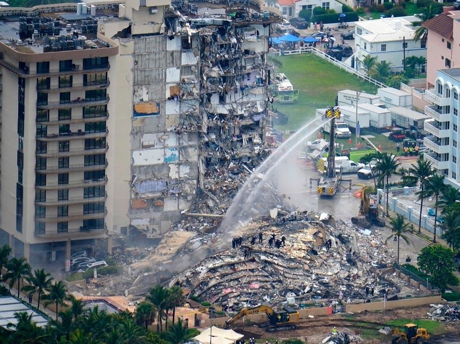 The swimming pool deck of the beachfront South Florida condominium where 98 people died when the building collapsed two years ago failed to comply with the original codes and standards.