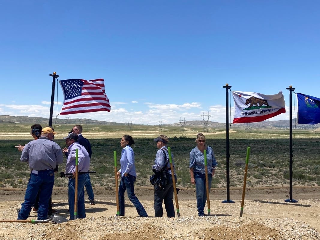U.S. Interior Secretary Deb Haaland, center, takes part in a groundbreaking ceremony Tuesday, June 20, 2023, for the TransWest Express transmission line south of Rawlins, Wyo. 