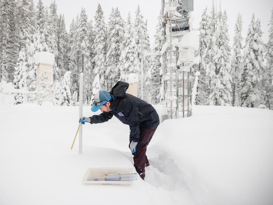 Dr. Gabe Lewis, a research scientist, measures snow depth and mass to calculate density and snow water equivalent at Central Sierra Snow Lab in Soda Springs, Calif. on Monday, Jan. 5, 2026. 