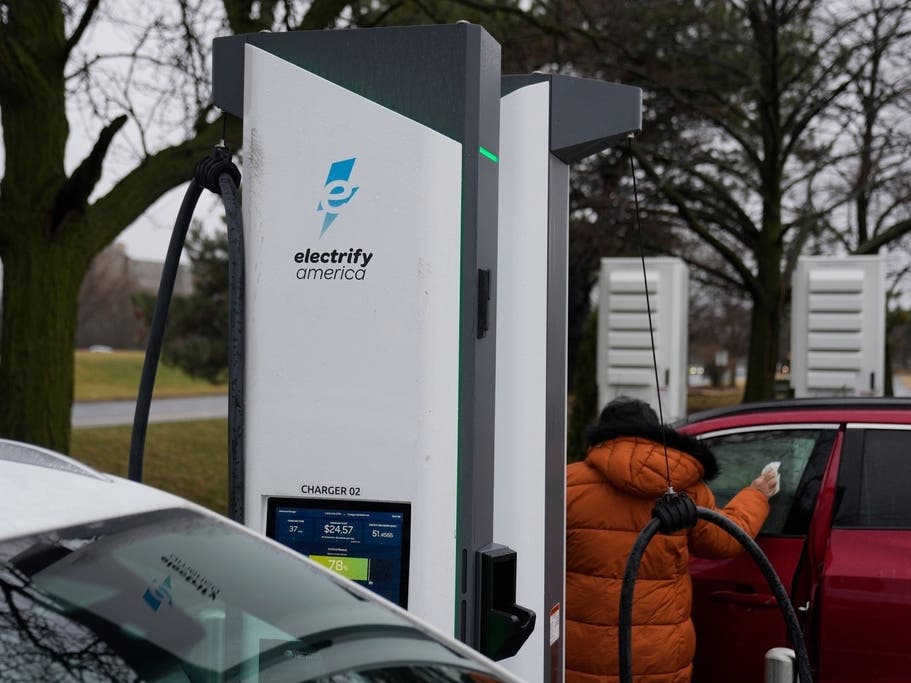 Electric vehicles charge at a station Wednesday, March 11, 2026, in Lincolnwood, Ill.