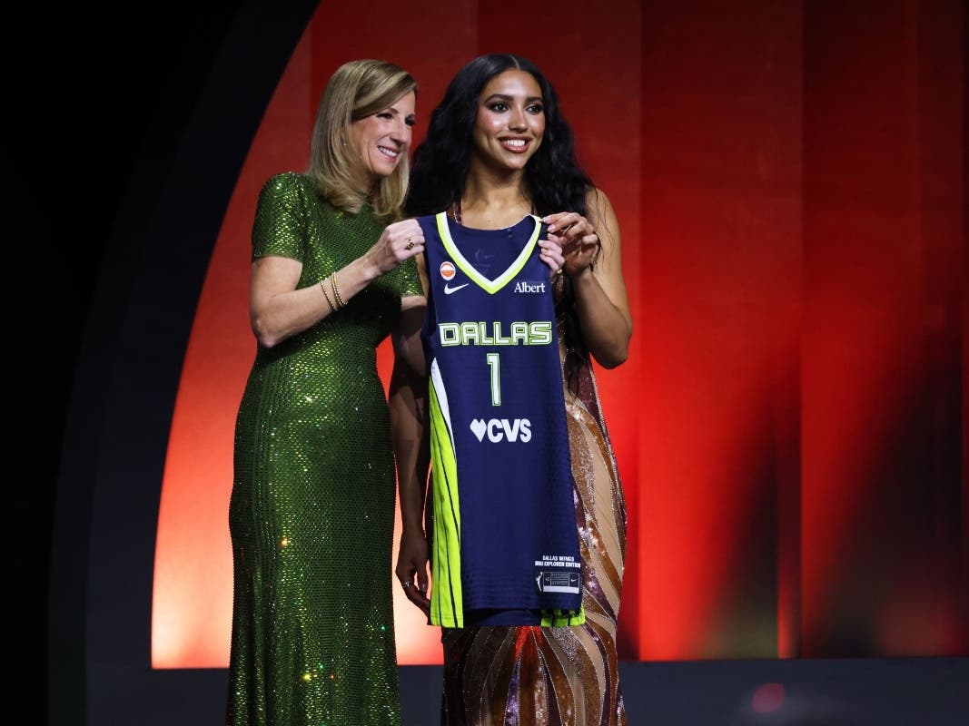 UConn guard Azzi Fudd of Arlington poses with WNBA commissioner Cathy Engelbert after being selected first overall by the Dallas Wings in the first round of the WNBA basketball draft Monday, April 13, 2026, in New York.