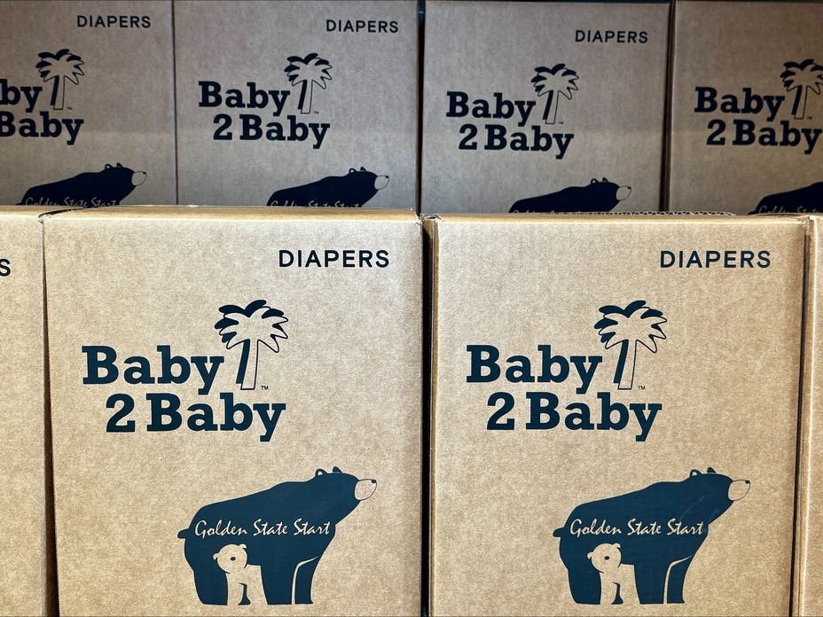This photo provided by Baby2Baby shows stacks of packaged diapers Wednesday, May 7, 2026, at Baby2Baby's Los Angeles headquarters. 