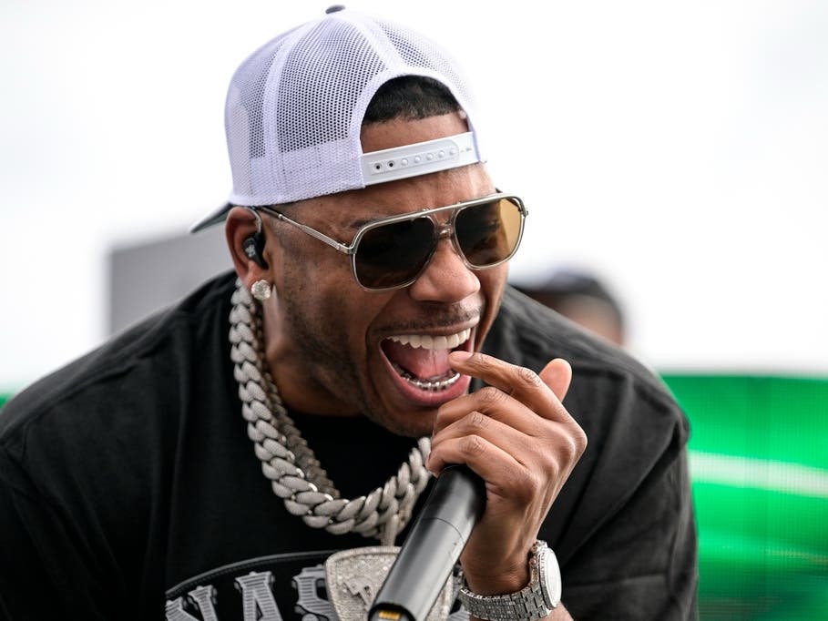 Rapper Nelly performs prior to a NASCAR Cup Series auto race at Charlotte Motor Speedway, Sunday, Oct. 9, 2022, in Concord, N.C. 