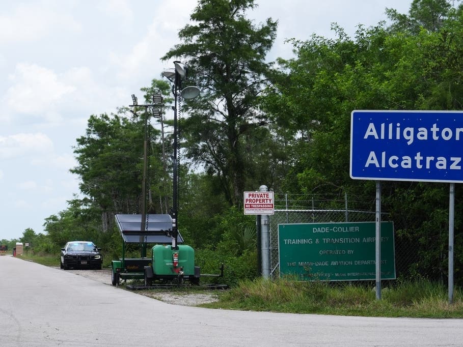 A car drives near the entrance to the "Alligator Alcatraz" detention center Monday, May 11, 2026, in Ochopee, Fla.