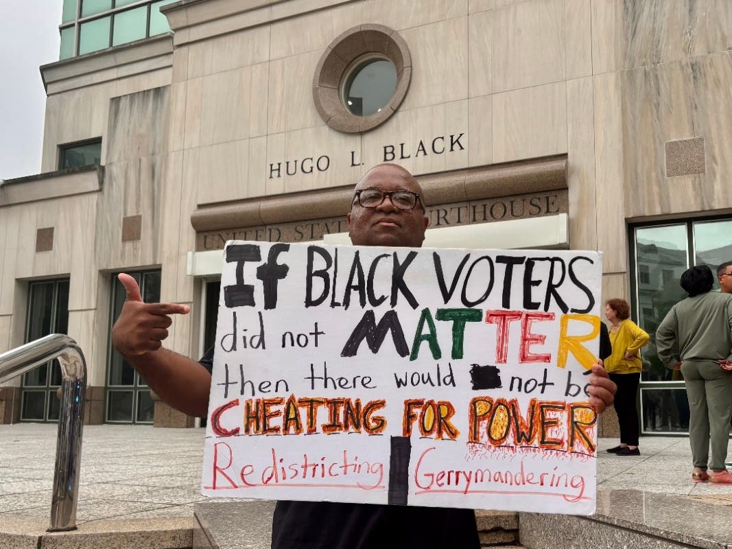 Federal court blocks Alabama plan for new congressional districts that could help Republicans Travis Jackson stands outside the federal courthouse on Friday, May 22, 2026, in Birmingham, Ala. after a court hearing related to redistricting litigation.