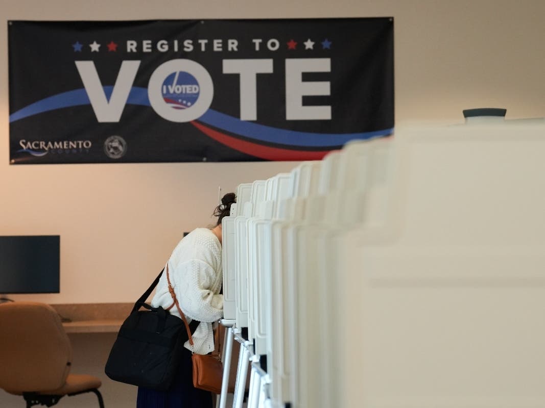 A voter casts her ballot for the California primary election on Tuesday, June 2, 2026, in Sacramento, Calif.