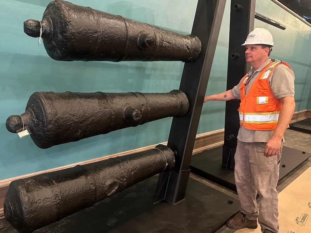 Cannons, which sunk to the bottom of the Savannah River during the American Revolution, sit on a rack after arriving at the Savannah History Museum in Savannah, Ga.,