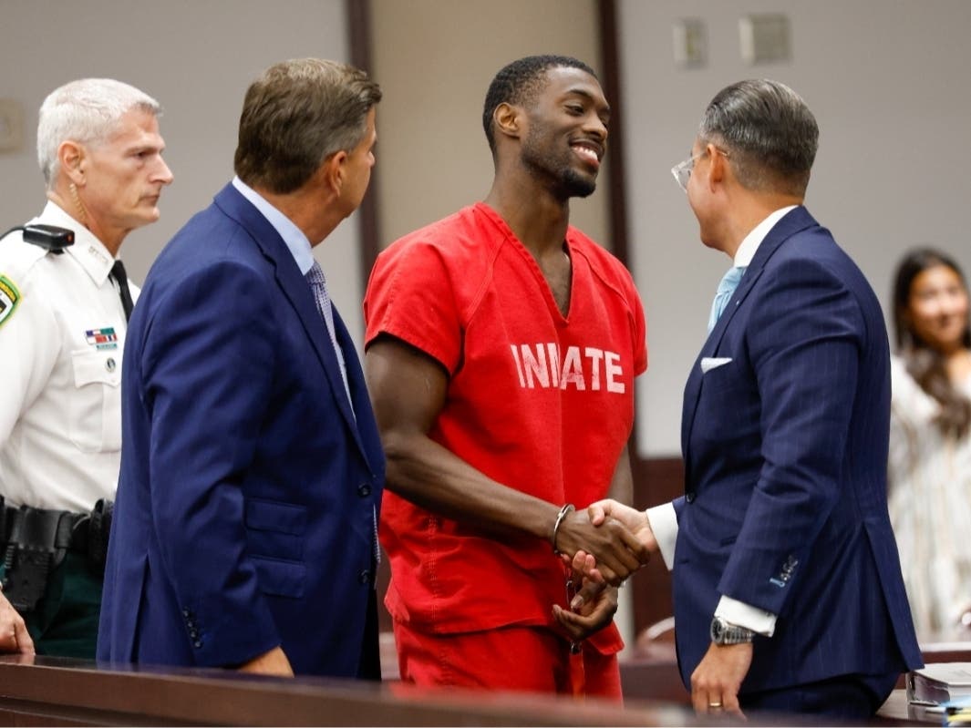 Terrion Arnold, a Detroit Lions cornerback, shakes hands with his attorneys R. Timothy Jansen, left, and A.J. Alvarez, during the conclusion of his pretrial detention hearing at the Hillsborough County Courthouse on Monday, June 29, 2026, in Tampa, Fla
