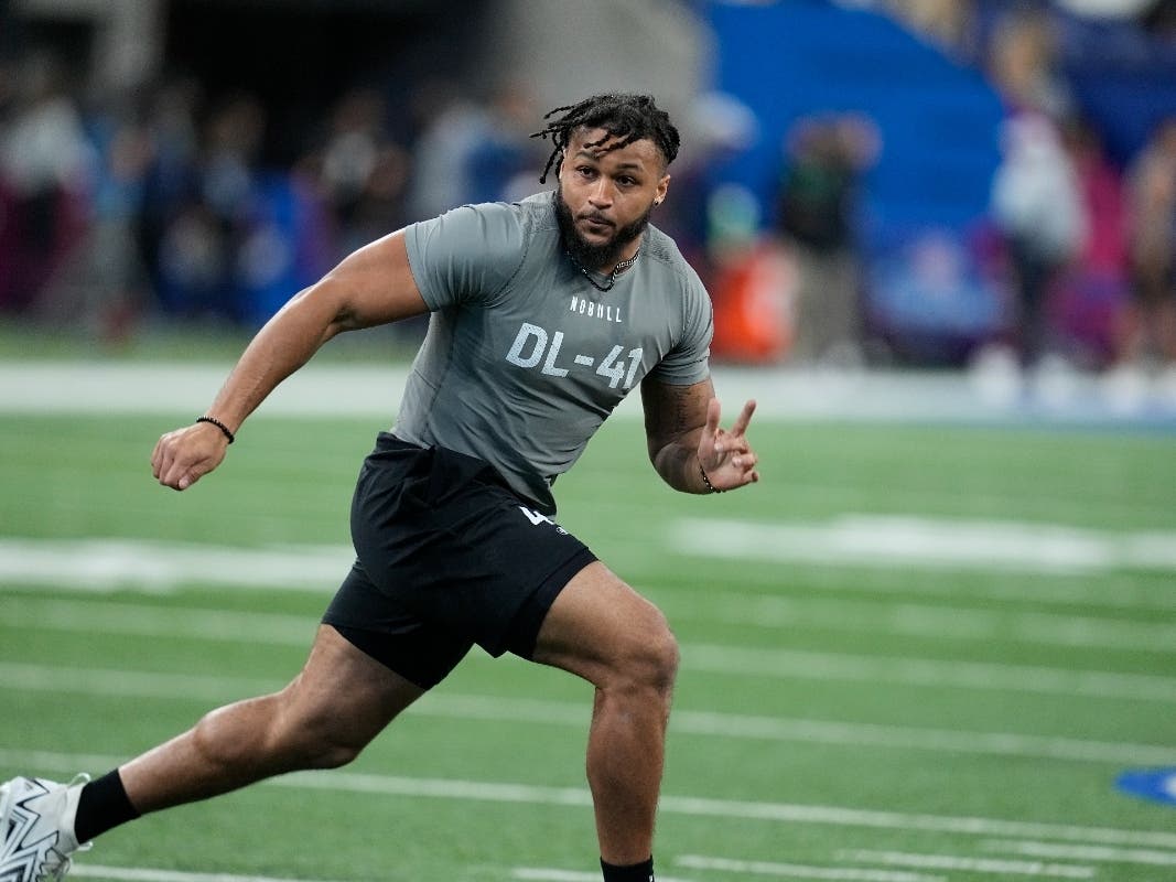 Former Western Michigan defensive lineman Marshawn Kneeland runs a drill at the NFL football scouting combine in 2024. Months after his death, his family announced he had early-stage CTE.