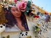 A makeshift memorial for Celeste Rivas Hernandez, whose body was found inside a vehicle owned by singer D4vd, is displayed outside her home in Lake Elsinore, Calif., on April 21, 2026.