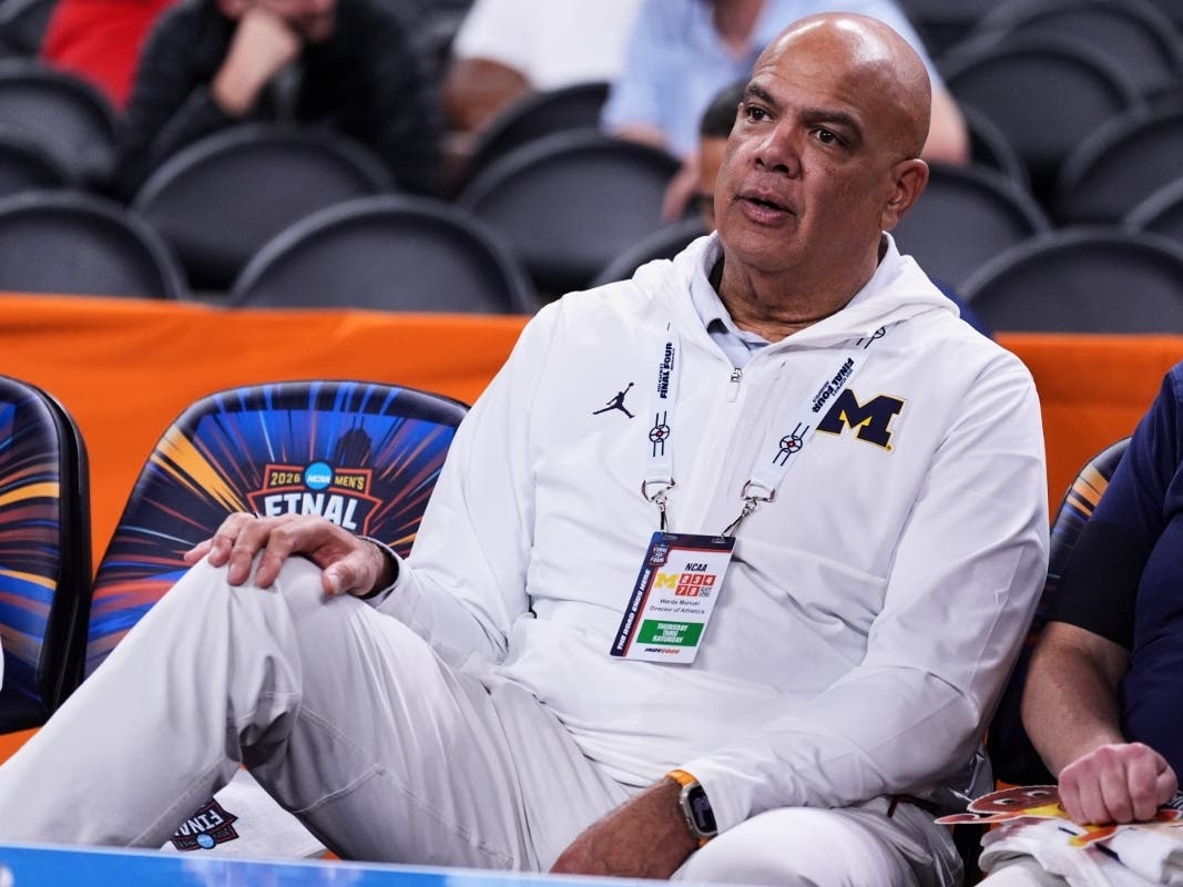 Michigan athletic director Warde Manuel watches Michigan practice ahead of an NCAA college basketball tournament semifinal game against Arizona at the Final Four, April 3, 2026, in Indianapolis. 