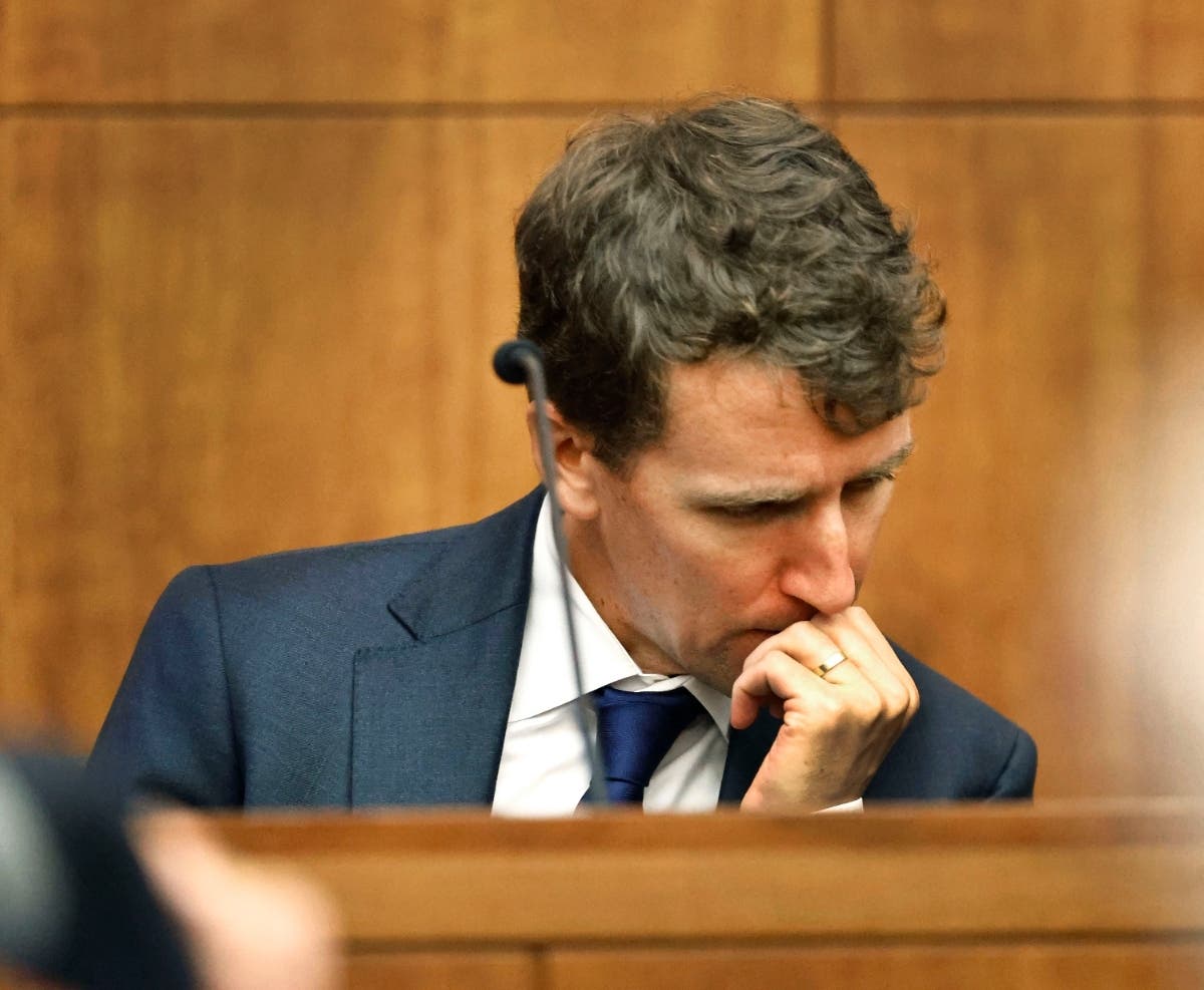 Patrick Clancy reacts as images of himself and his children on vacation a month before they were killed is shown in the courtroom at Plymouth Superior Court in Plymouth, Mass., Monday, July 27, 2026.