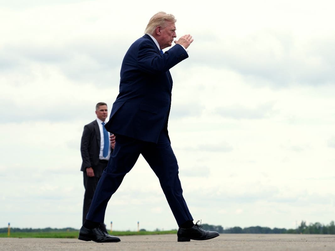 President Donald Trump walks to board Air Force One at Morristown Municipal Airport, in Morristown, N.J., Sunday, Aug. 2, 2026, en route to return to Washington.