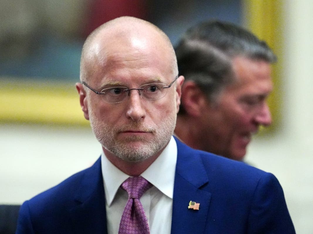 Federal Communications Commission Chairman Brendan Carr departs an event in the East Room of the White House, March 20, 2026, in Washington.