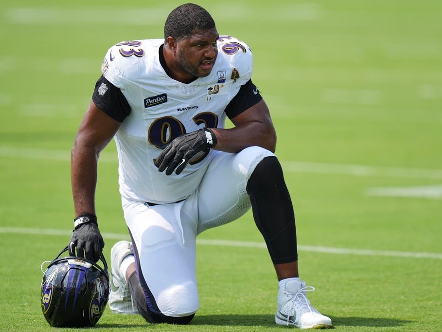 Baltimore Ravens defensive end Calais Campbell (93) watches during the team's NFL football training camp, Tuesday, Aug. 11, 2026, at the Under Armour Performance Center in Owings Mills, Md.