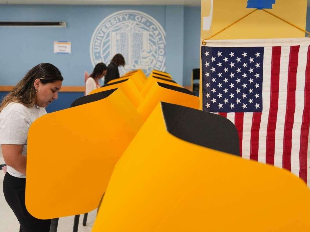  Voters cast their ballots at a voting center on the UCLA campus, June 2, 2026, in Los Angeles.