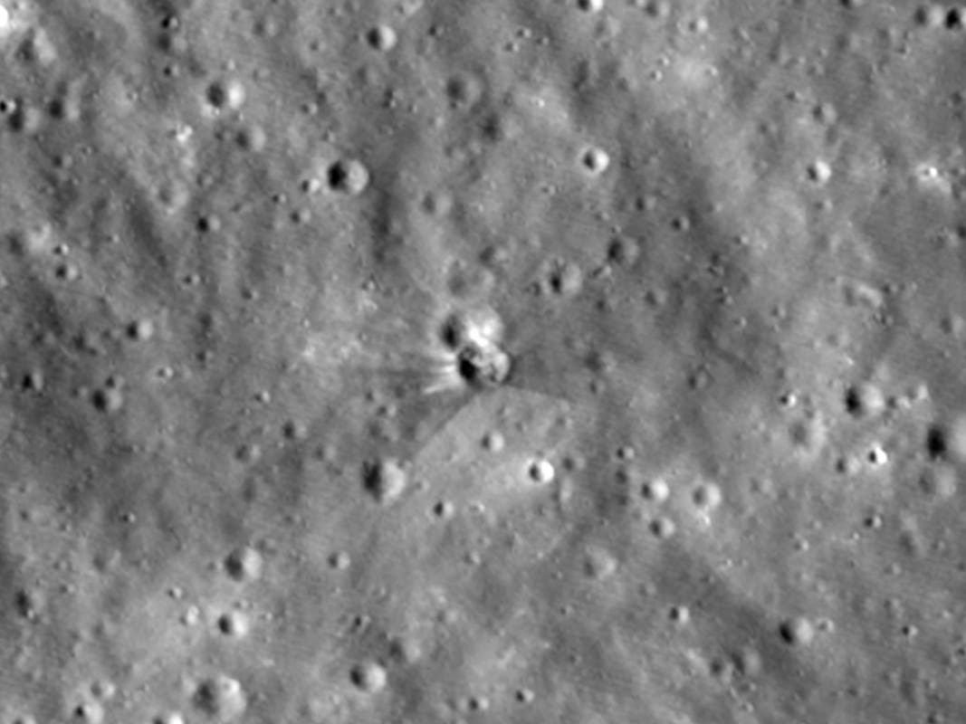 This photo provided by NASA on Tuesday, Aug. 18, 2026, taken by the Lunar Reconnaissance Orbiter, shows a fresh crater on the moon created by a collision with a SpaceX rocket.