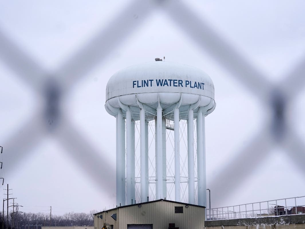 The Flint water plant tower is seen, Jan. 6, 2022, in Flint, Mich.