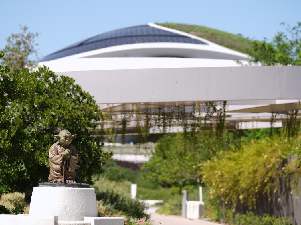 A sculpture of the "Star Wars" character Yoda is displayed along a walking path in the garden area of the the Lucas Museum of Narrative Art during a preview of the museum on Monday, Aug. 31, 2026, in Los Angeles.