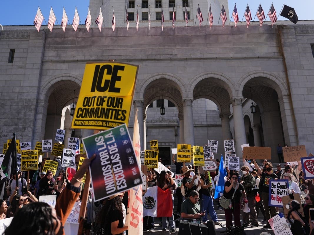 People gather on the steps of Los Angeles City Hall during a protest on Jan. 30, 2026 in Los Angeles.