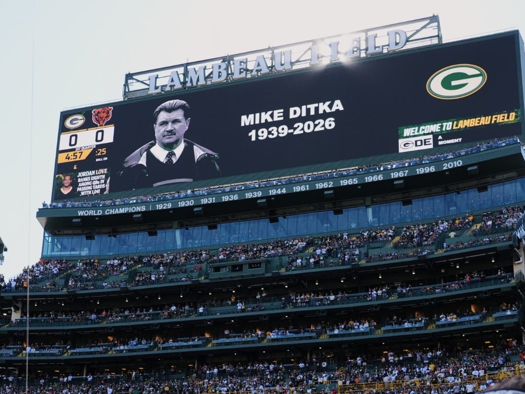 Former Chicago Bears Mike Ditka is honored before an NFL football game against the Green Bay Packers in Green Bay, Wis., on Sunday.