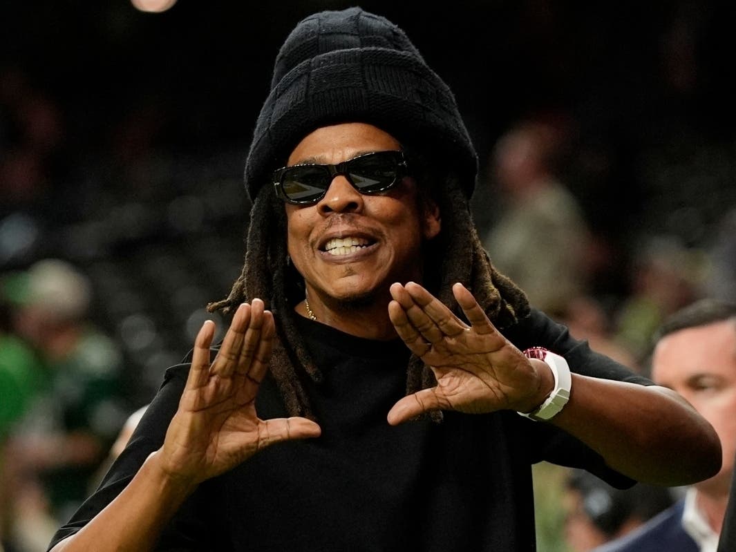 Jay-Z gestures from the sidelines prior to the NFL Super Bowl 59 football game, Feb. 9, 2025, in New Orleans.