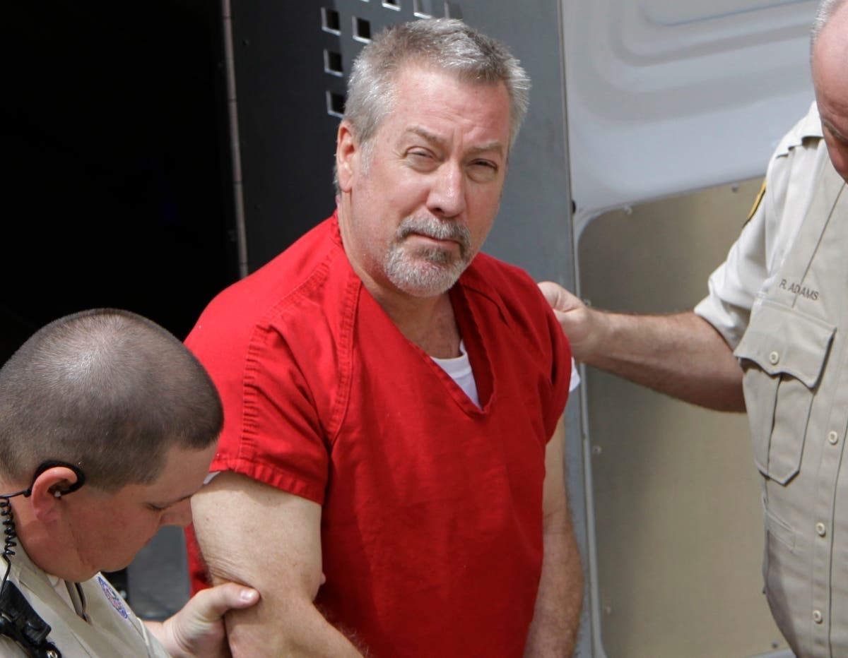 In this May 8, 2009, file photo, former Bolingbrook police sergeant Drew Peterson arrives at the Will County Courthouse in Joliet for his arraignment on charges of first-degree murder in the 2004 death of his former wife Kathleen Savio.