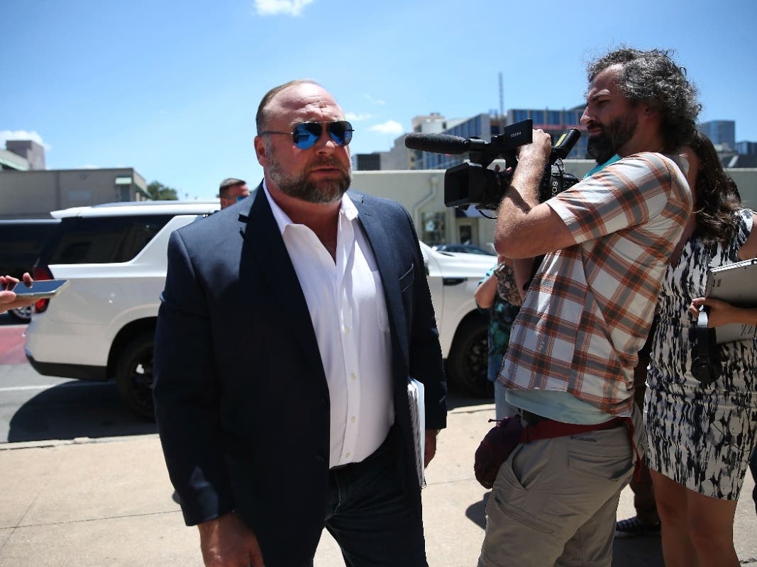 Alex Jones arrives at the Travis County Courthouse in Austin, Tuesday Aug. 2, 2022.
