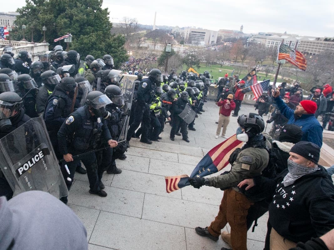 U.S. Capitol Police push back rioters who were trying to enter the U.S. Capitol on on Jan. 6, 2021, in Washington.