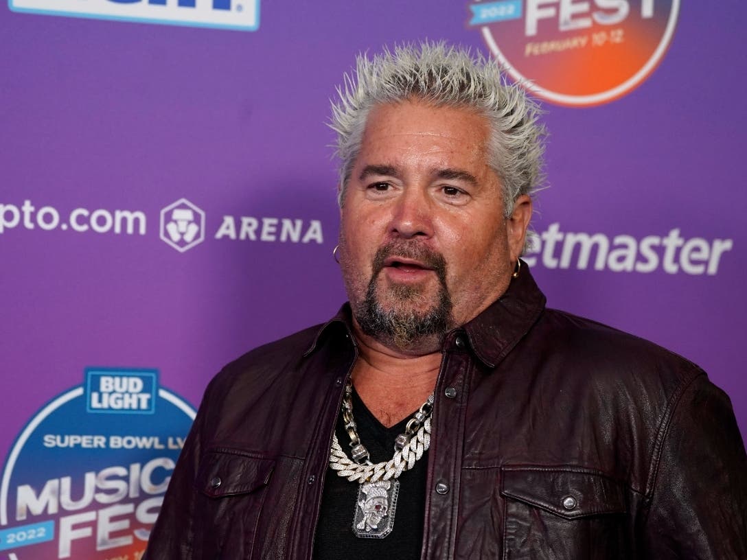 Chef Guy Fieri arrives on day three of the Bud Light Super Bowl Music Fest, Saturday, Feb. 12, 2022, at Crypto.com Arena in Los Angeles. His team stopped by Crazy Burger Cafe and Juice Bar on Wednesday to film a segment of Fieri's show "Triple D Nation." 