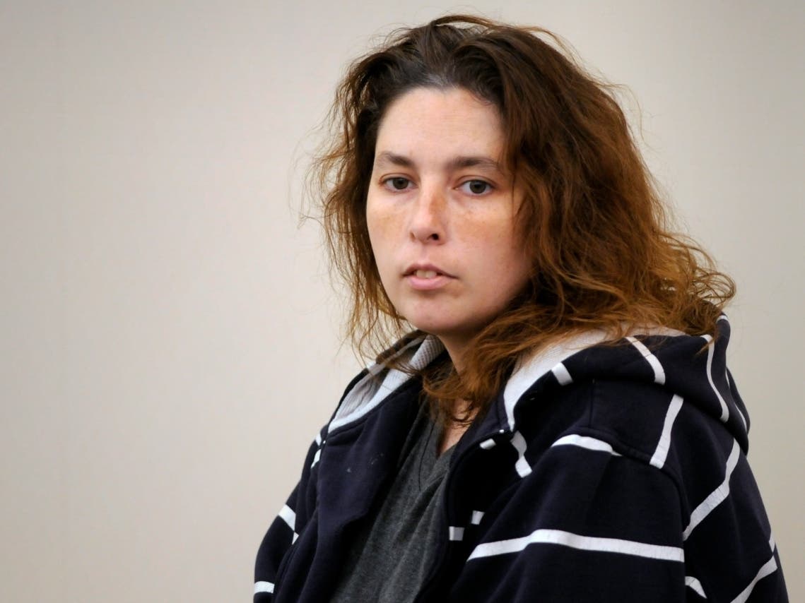 Murray was found guilty of a lesser charge of assault. Three dead infants were found in her home in 2014.