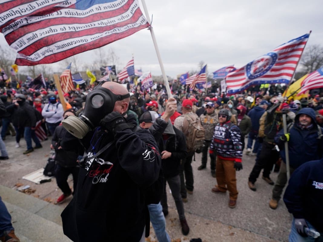 Trump supporters gather outside the Capitol, Wednesday in Washington. As Congress prepares to affirm President-elect Joe Biden's victory, thousands of people gathered.