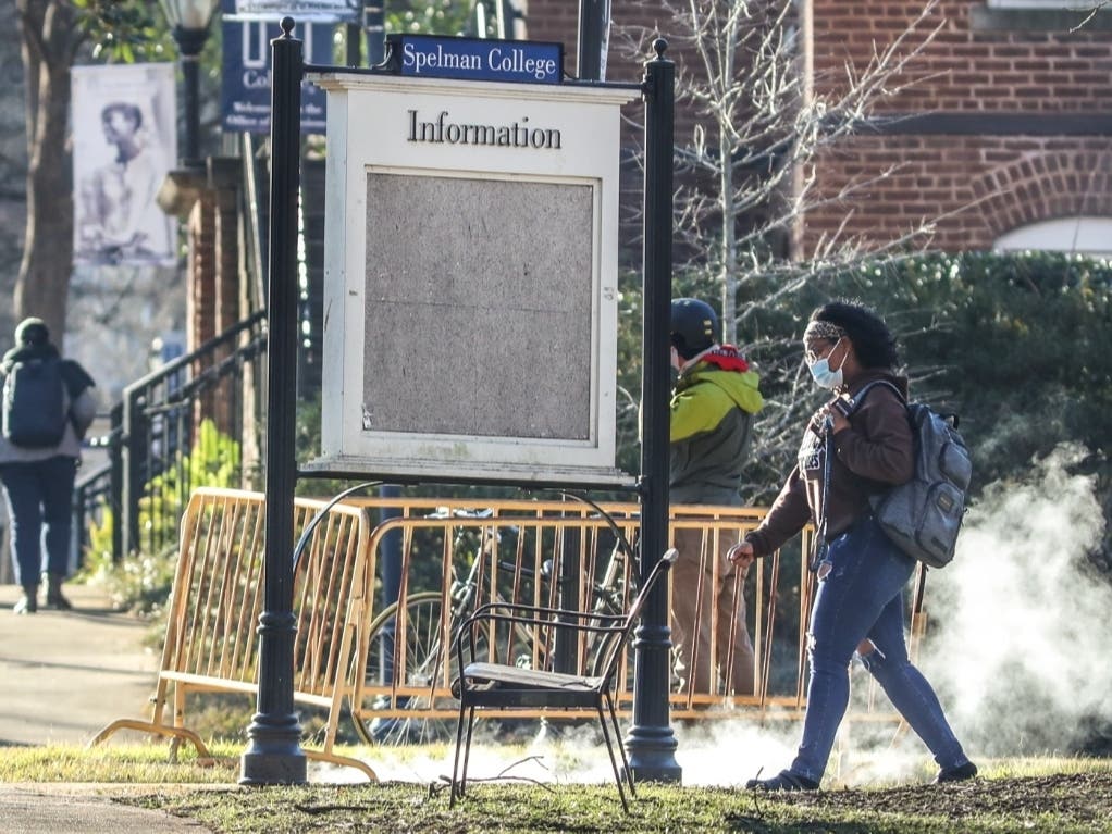People arrived outside the Spelman campus Tuesday morning, Feb. 1, 2022 after two historically Black colleges in Georgia received bomb threats, a disturbing trend that many HBCUs across the country have been threatened with in recent weeks.
