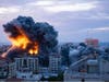 Fire and smoke rises following an Israeli airstrike, in Gaza City, Saturday, Oct. 7, 2023.