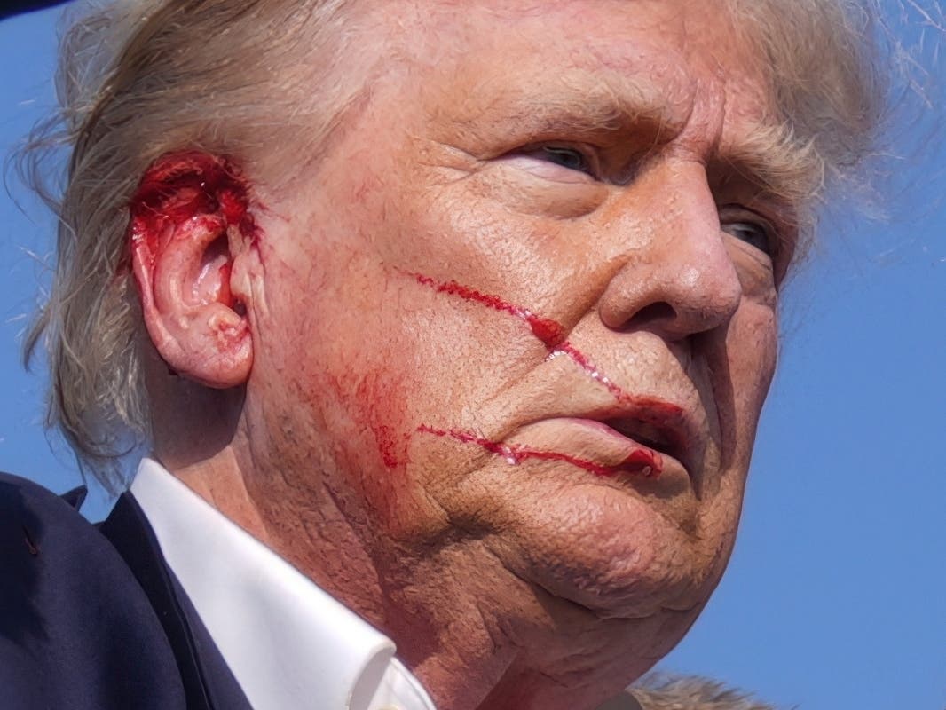 Shooting at Trump rally in Pennsylvania: Republican presidential candidate former President Donald Trump is moved from the stage at a campaign rally, Saturday, July 13, 2024, in Butler, Pa.