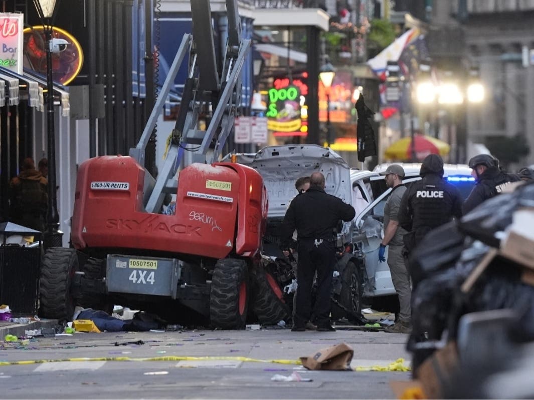 Emergency services attend the scene on Bourbon Street after a vehicle drove into a crowd on New Orleans' Canal and Bourbon Street, Wednesday Jan. 1, 2025.