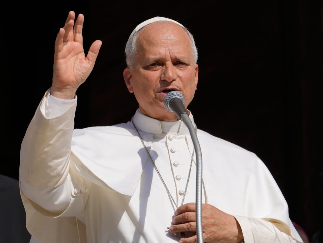FILE - Pope Leo XIV delivers his blessing as he visits Pavia's Cathedral, northern Italy, on June 20, 2026.