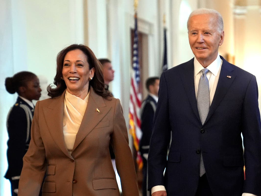 Vice President Kamala Harris, left, and President Joe Biden arrive for an event in the East Room of the White House, May 9, 2024, in Washington. The 59-year-old Harris was endorsed by Biden on Sunday, July 21, after he stepped aside.