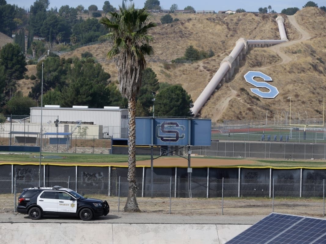 Students at Santa Clarita's Saugus High School returned to classes Monday 2 1/2 weeks after a 16-year-old student shot five classmates.