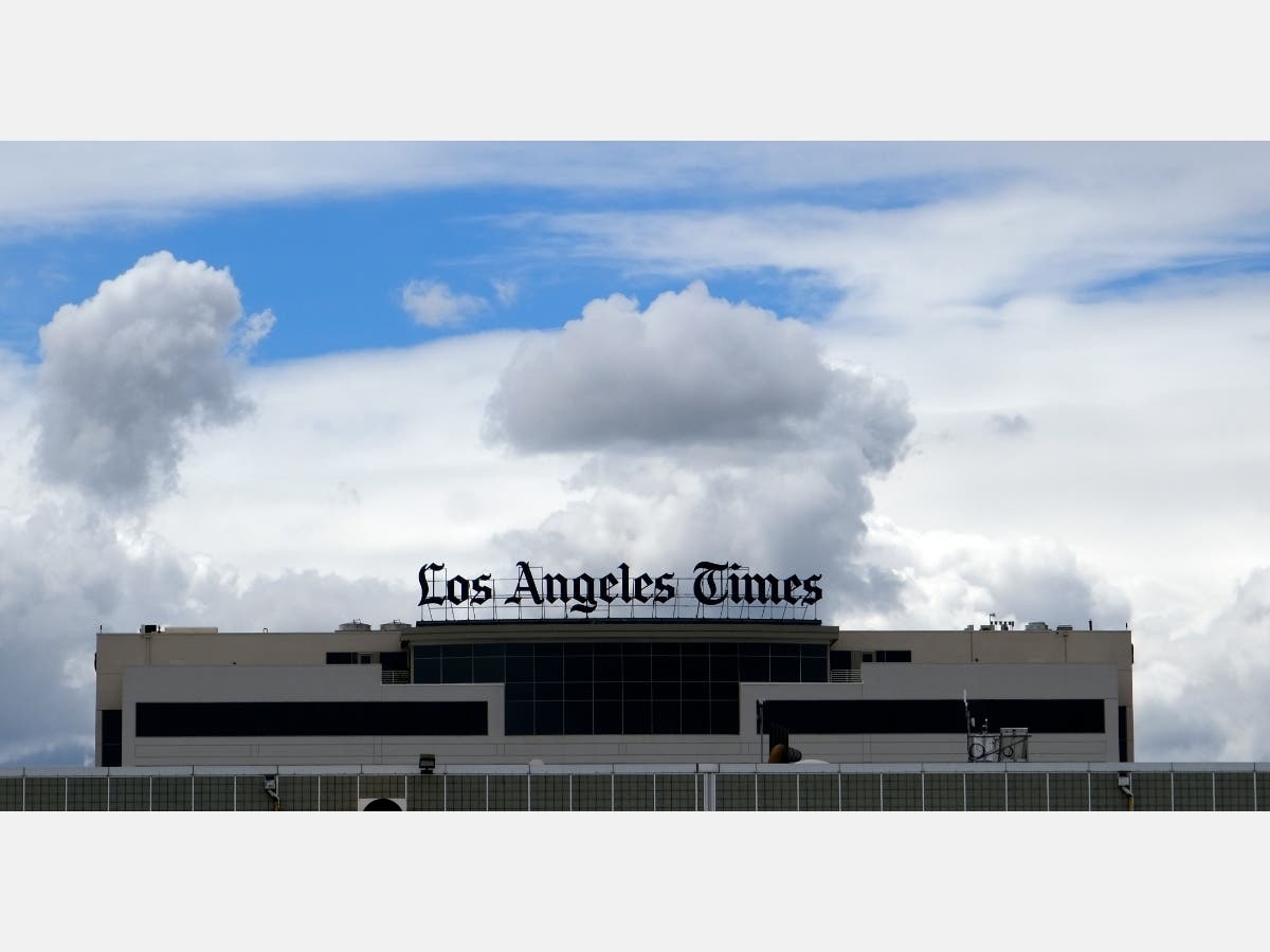 Art critic Christopher Knight and reporter Molly O'Toole won journalism's most coveted prize for their work at the Los Angeles Times. 