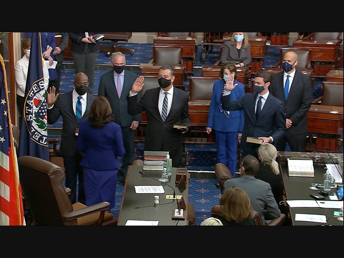  Vice President Kamala Harris swears in Sen. Raphael Warnock, D-Ga., Sen. Alex Padilla, D-Calif., and Sen. Jon Ossoff, D-Ga., on the floor of the Senate.