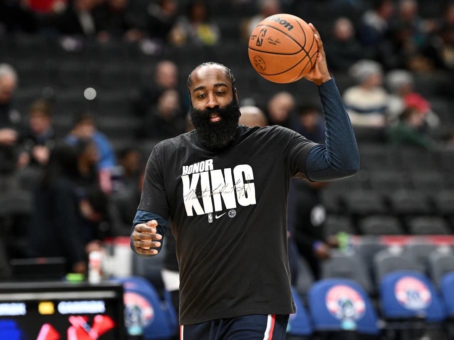 Los Angeles Clippers guard James Harden warms up while wearing a shirt paying tribute to Martin Luther King Jr. before of an NBA basketball game against the Washington Wizards, Monday, Jan. 19, 2026, in Washington.