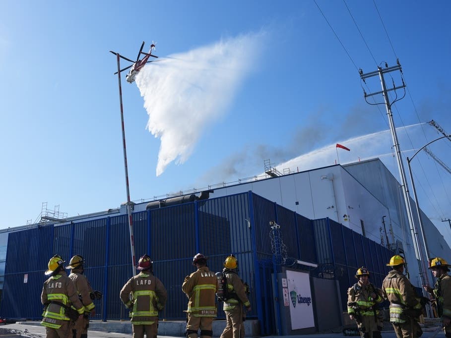 Crews work a warehouse fire in the Boyle Heights section of Los Angeles on Wednesday, June 17, 2026.