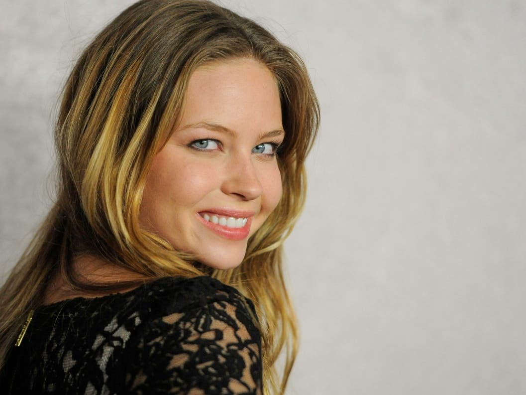 Actor Daveigh Chase poses at the Season 5 premiere of HBO series "Big Love," in Los Angeles on Jan. 12, 2011.