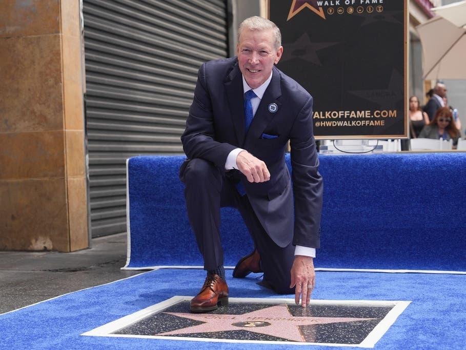 Former Los Angeles Dodgers pitcher Orel Hershiser poses with his star on the Hollywood Walk of Fame in Los Angeles, Thursday, Aug. 13, 2026.