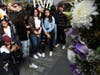 People gather at a makeshift memorial honoring former NBA player Kobe Bryant outside of the Staples Center prior to the start of the 62nd annual Grammy Awards at the Staples Center on Sunday, Jan. 26, 2020, in Los Angeles.