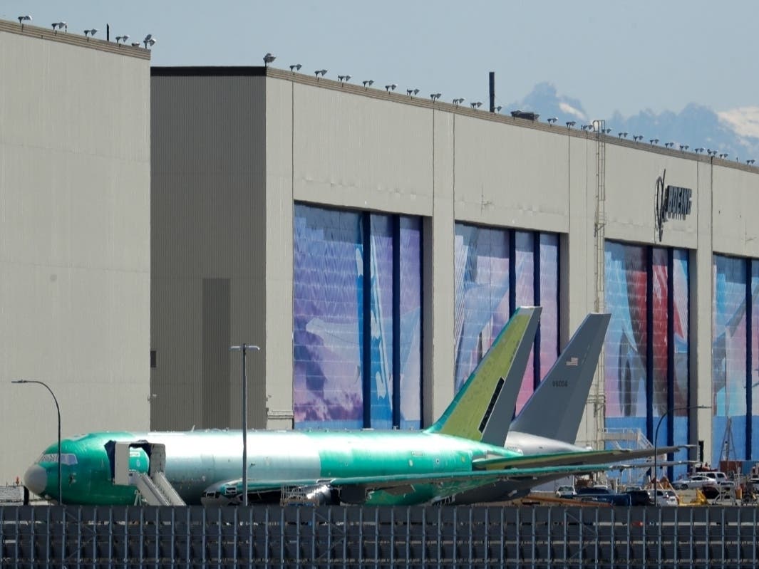 U.S. Air Force KC-46 tankers being built by Boeing sit parked Monday, April 13, 2020, at Boeing's airplane assembly facility in Everett, Wash. 