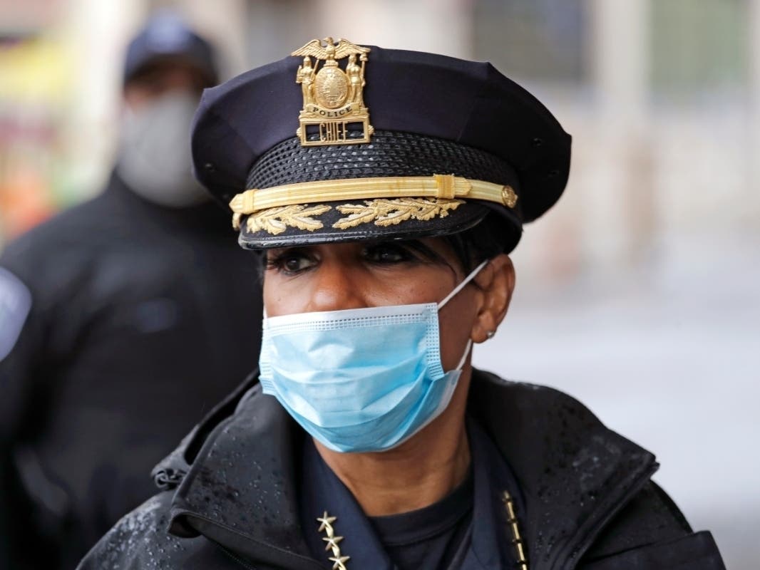 Seattle Police Chief Carmen Best walks Wednesday, July 1, 2020, in Seattle, where streets being her had been blocked off in an area demonstrators had occupied for weeks.