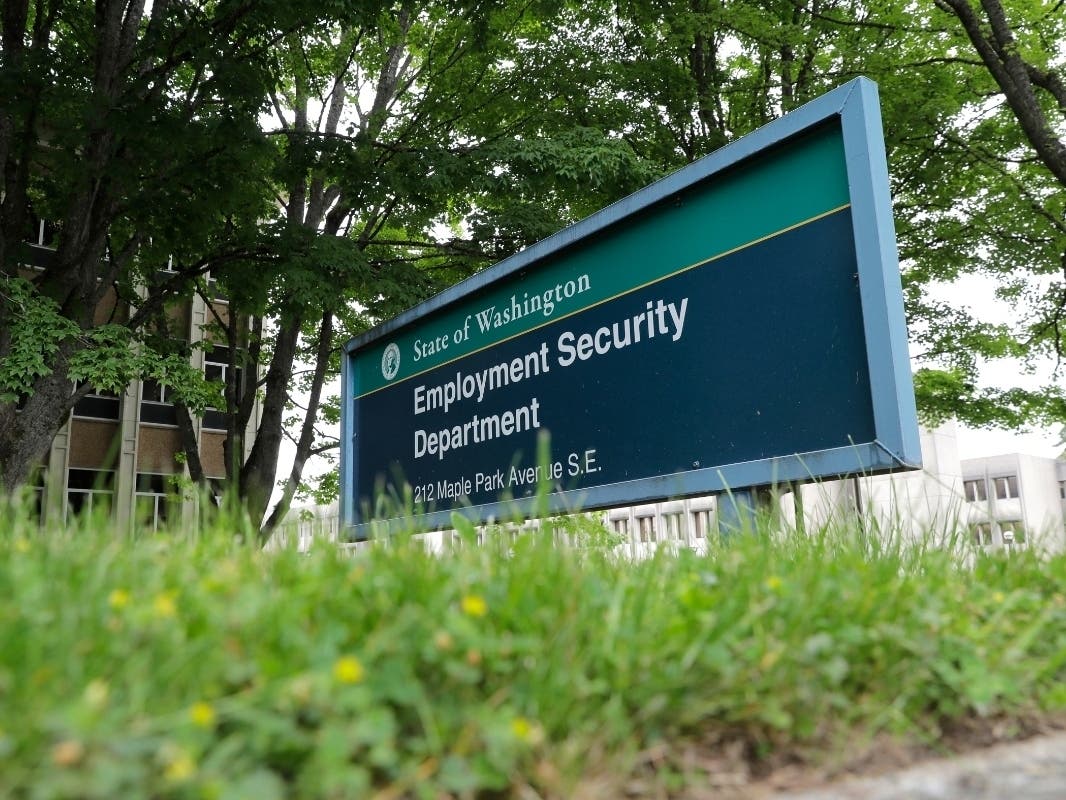 In this May 26, 2020, file photo, a sign at the headquarters for the Washington state Employment Security Department is shown at the Capitol in Olympia, Wash.