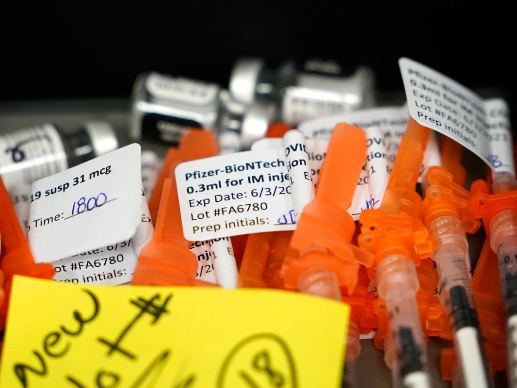 Syringes filled with Pfizer vaccines sit at the ready at a COVID-19 vaccination clinic at PeaceHealth St. Joseph Medical Center Thursday, June 3, 2021, in Bellingham, Wash.